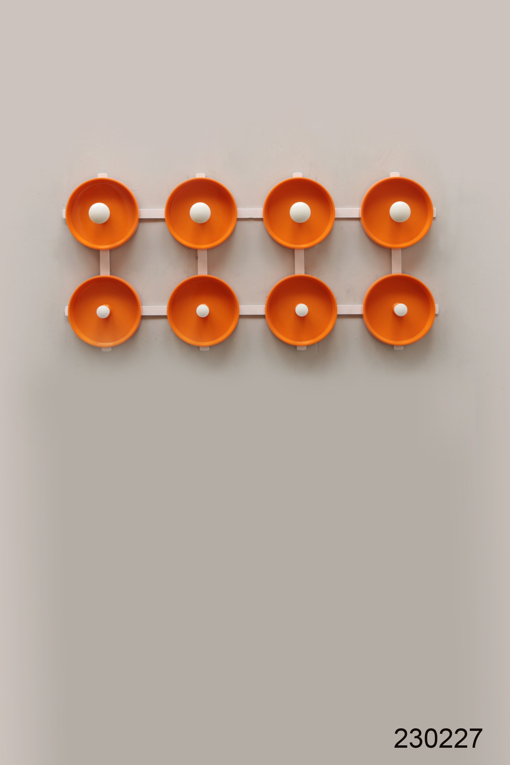 Oranje Spage age wandkapstok jaren60