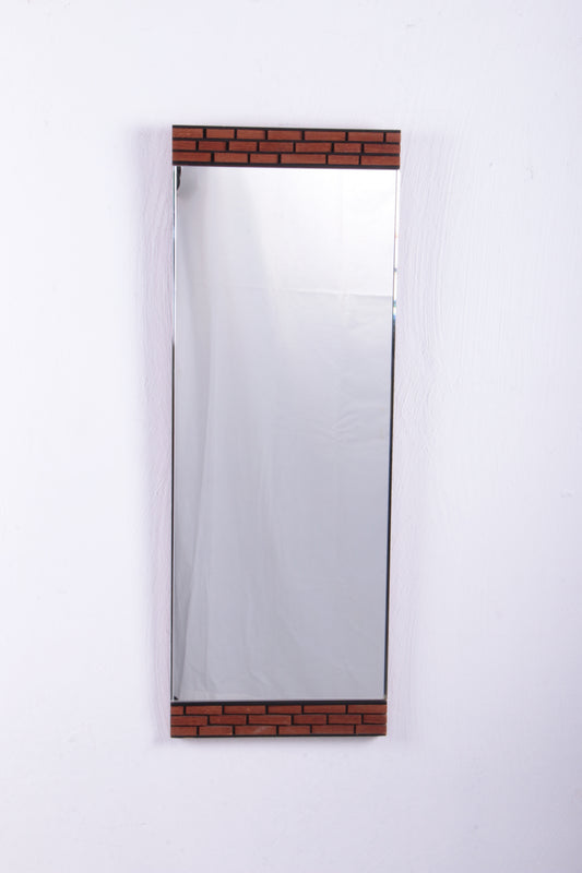 Oblong wall mirror with block pattern