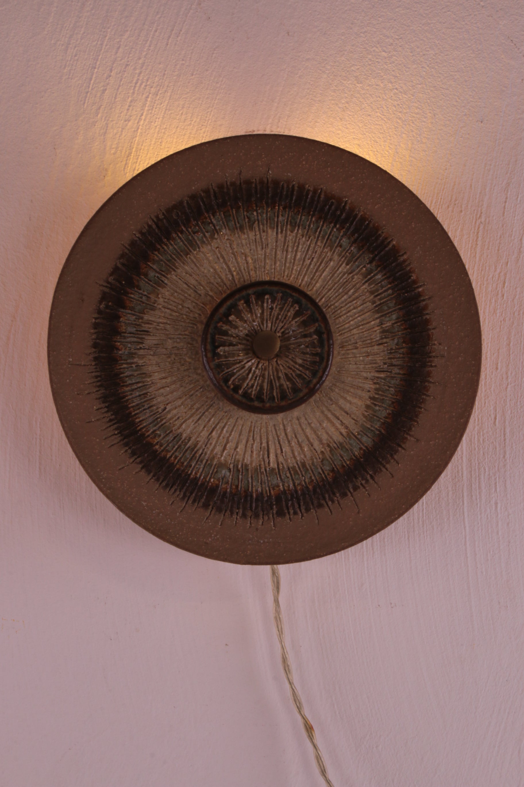 Soholm Wandlamp van Noomi Backhausen & Poul Brandborg voorkant licht aan