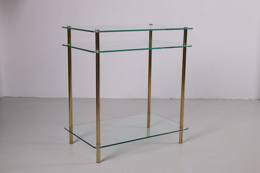 Hollywood Regency Bijzettafel met goudkleurige poten voorkant schuin