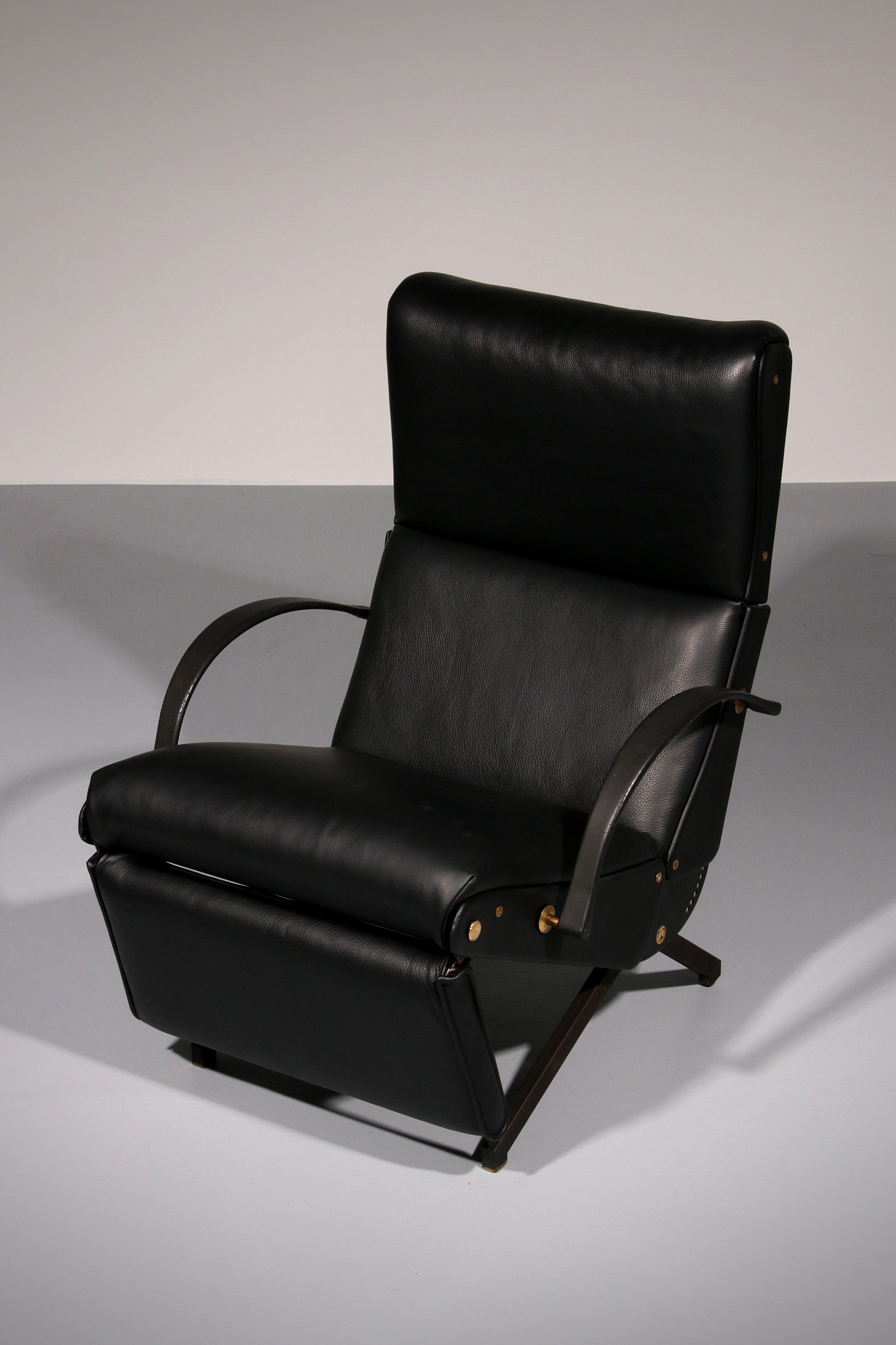 Italian Black Leather Adjustable P40 Relax Chair by Osvaldo Borsani Tecno.
