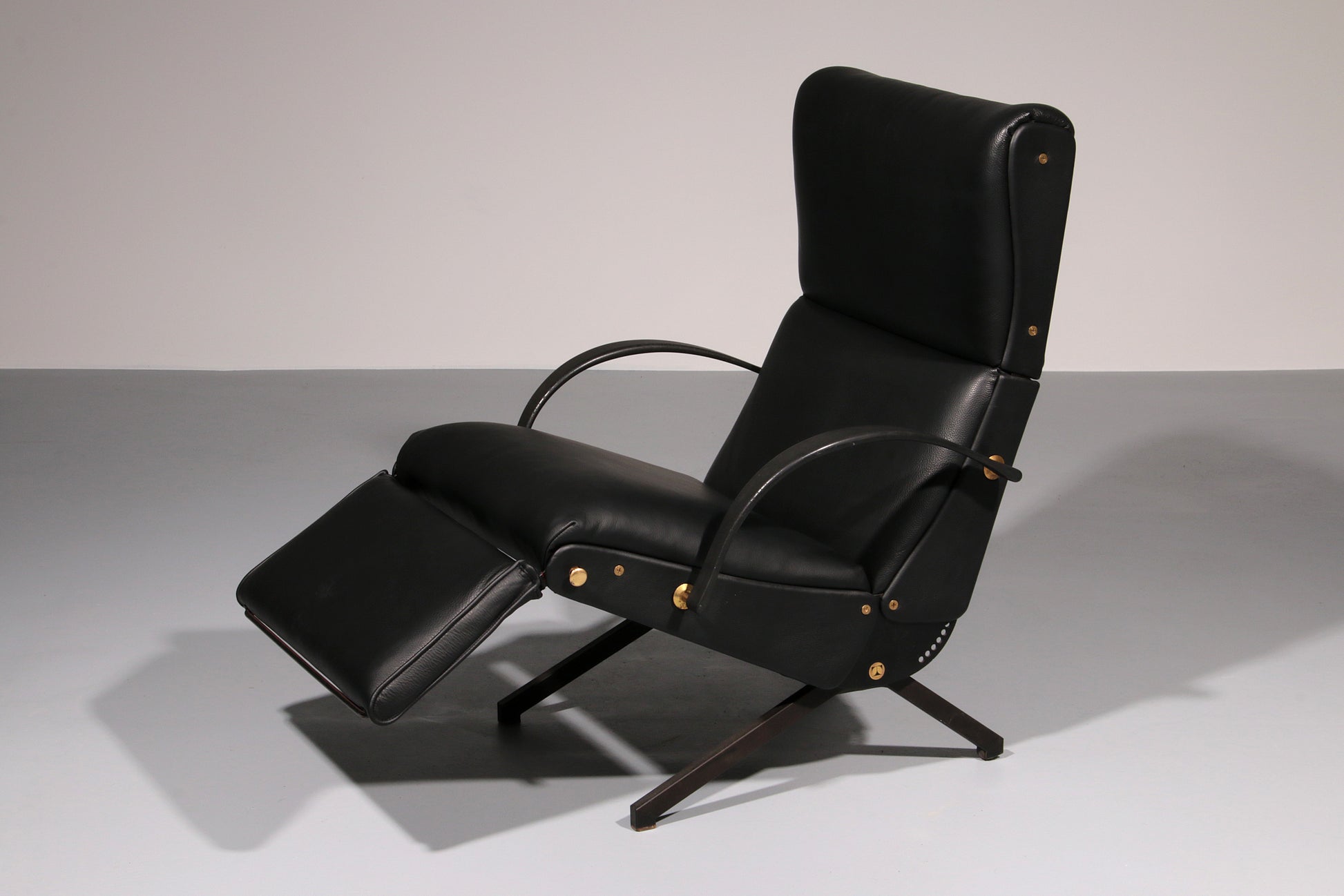 Italian Black Leather Adjustable P40 Relax Chair by Osvaldo Borsani Tecno.
