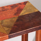 Lorenzo Burchiellaro, side table, copper and stained beechwood, Italy, 1960s.