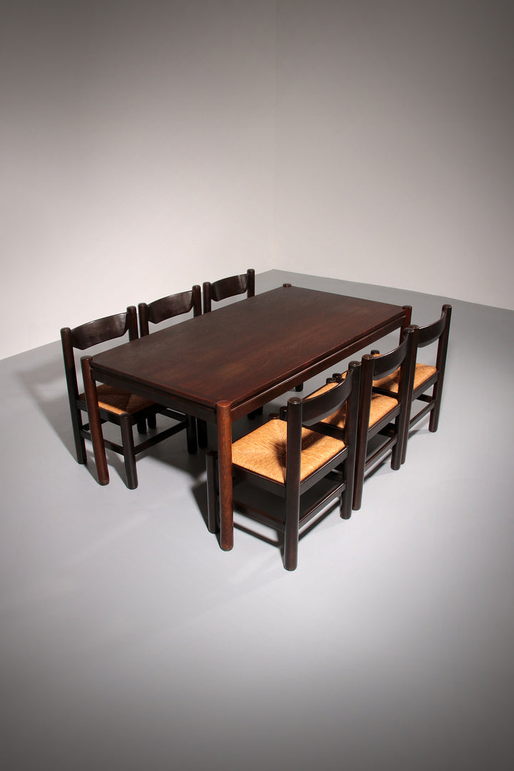 Dining Set inspired by Vico Magistretti, featuring six elegantly re-caned chairs and table.