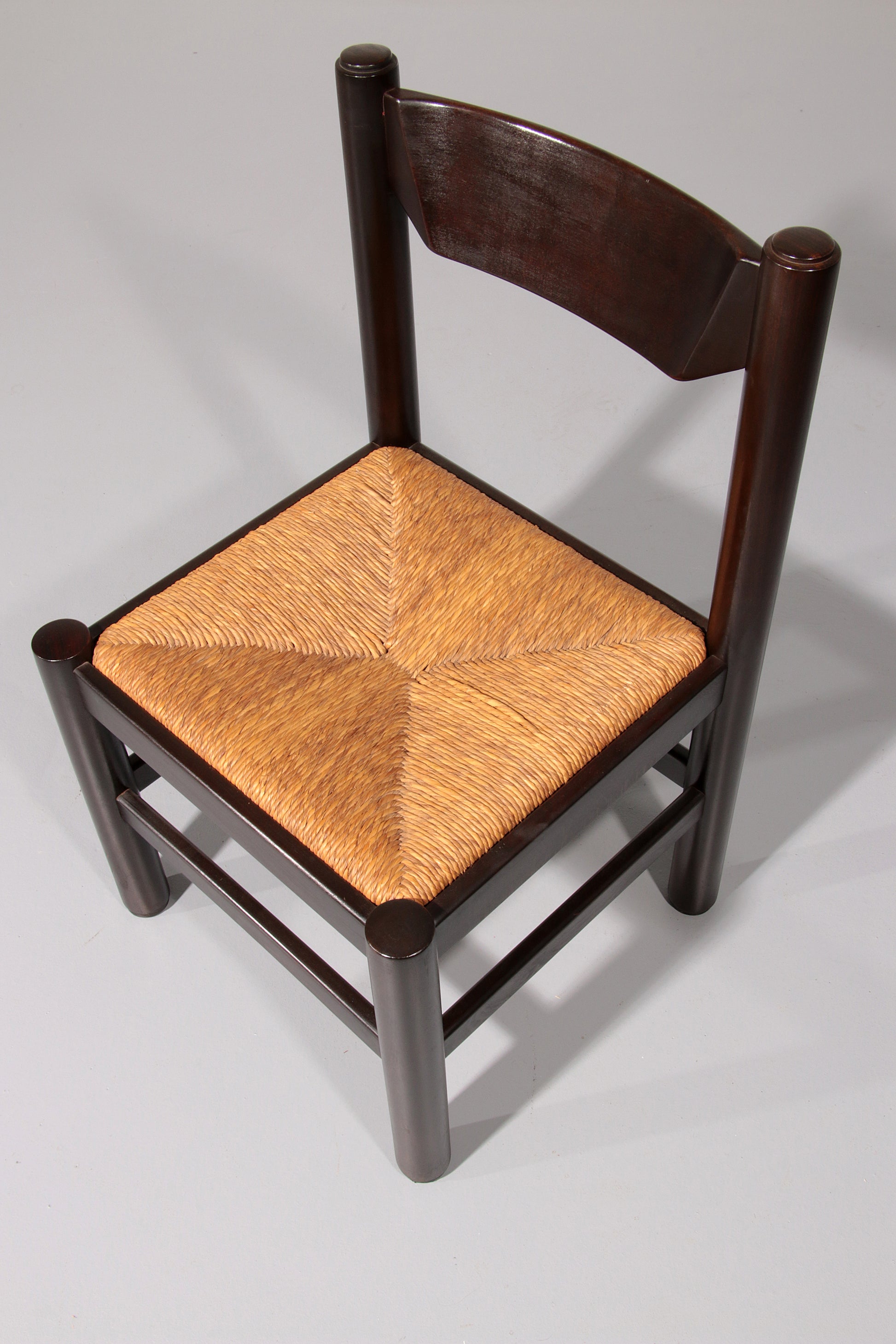 Dining Set inspired by Vico Magistretti, featuring six elegantly re-caned chairs and table.