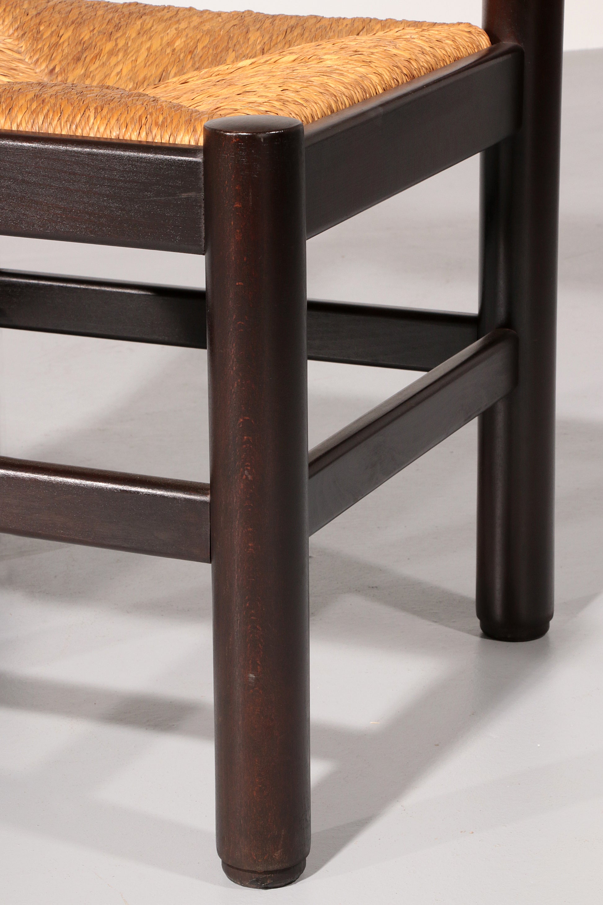 Dining Set inspired by Vico Magistretti, featuring six elegantly re-caned chairs and table.