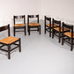 Dining Set inspired by Vico Magistretti, featuring six elegantly re-caned chairs and table.