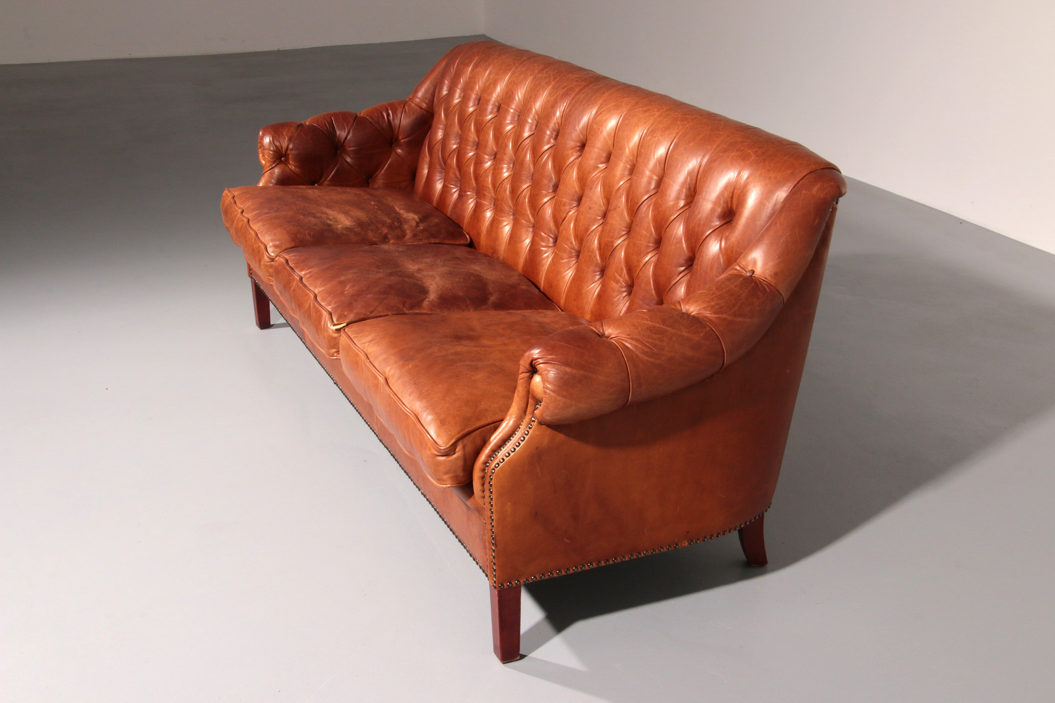Antiqued Chesterfield Leather Sofa