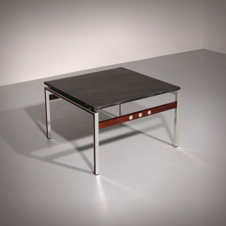 A beautiful and distinctive vintage coffee table, crafted in Denmark in the 1970s. The table combines a natural slate tabletop