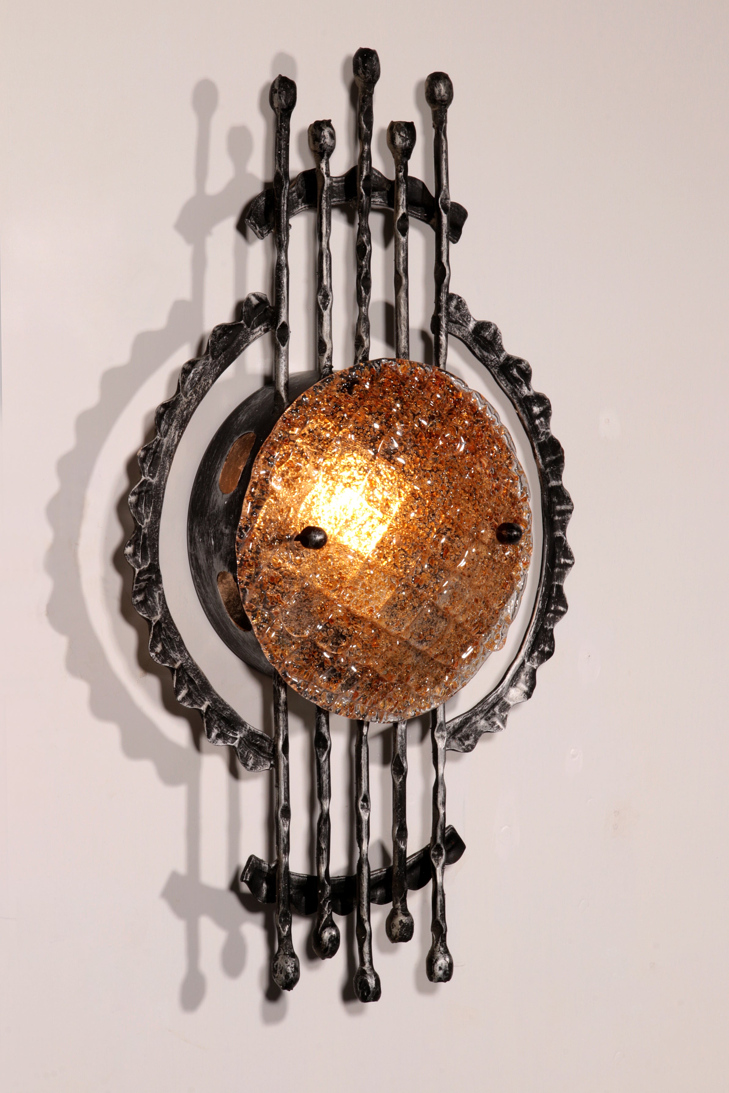 Pair of wrought iron and murano glass wall lights by Tom Ahlström & Hans Ehrich. 1970
