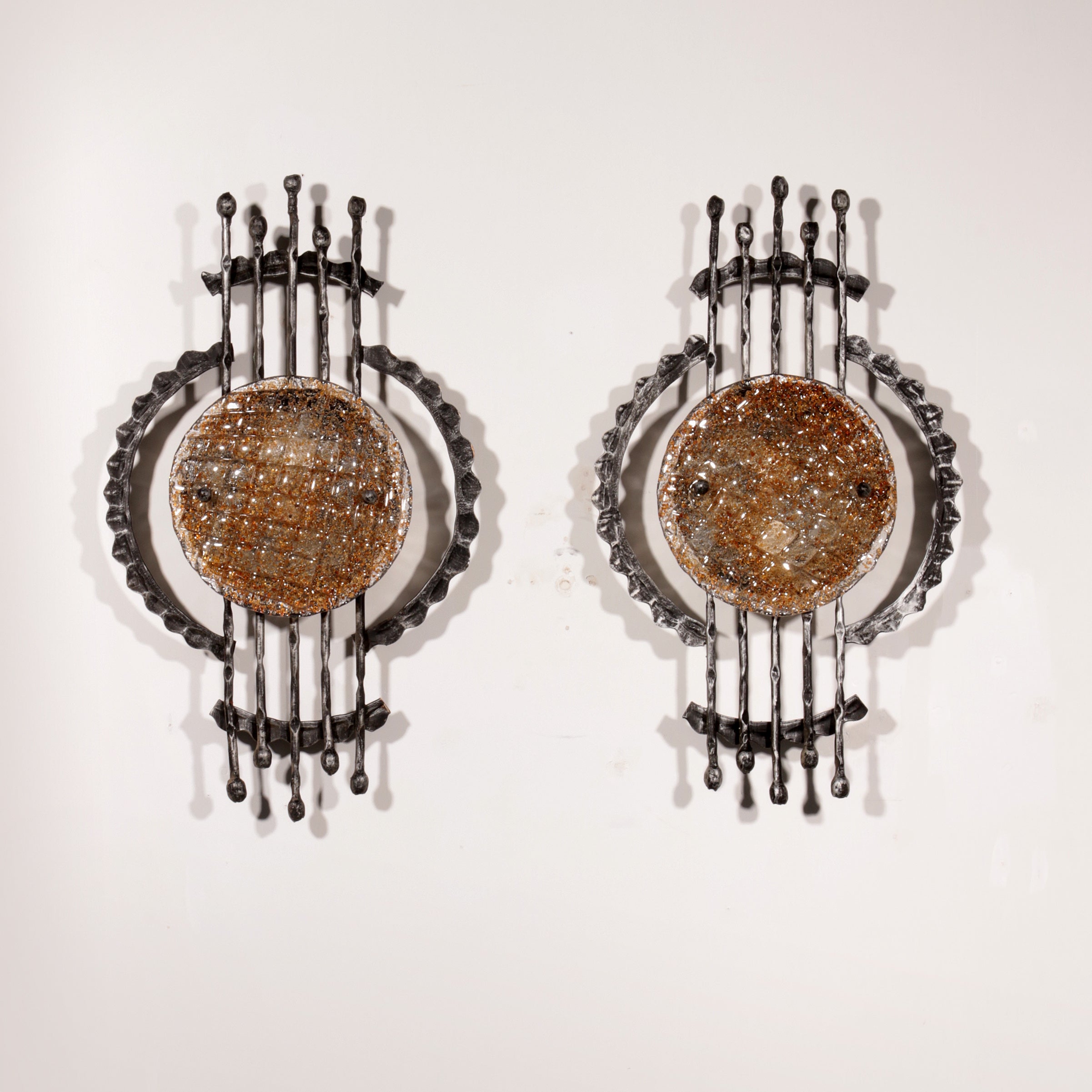 Pair of wrought iron and murano glass wall lights by Tom Ahlström & Hans Ehrich. 1970
