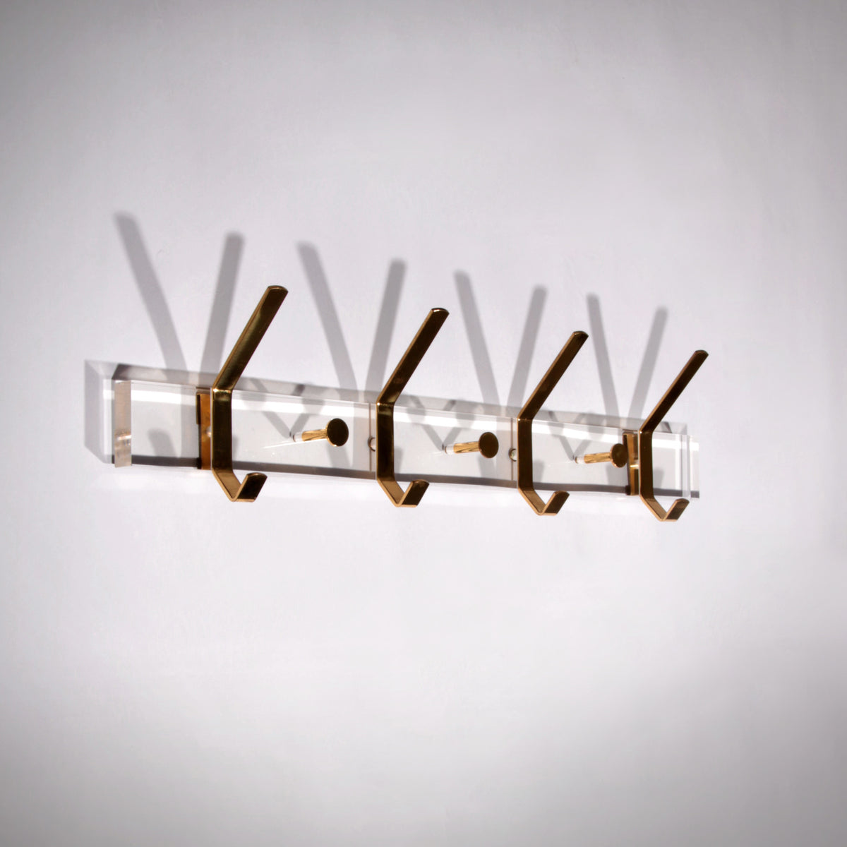 https://timeless-art.com/products/charles-hollis-jones-lucite-brass-coat-rack