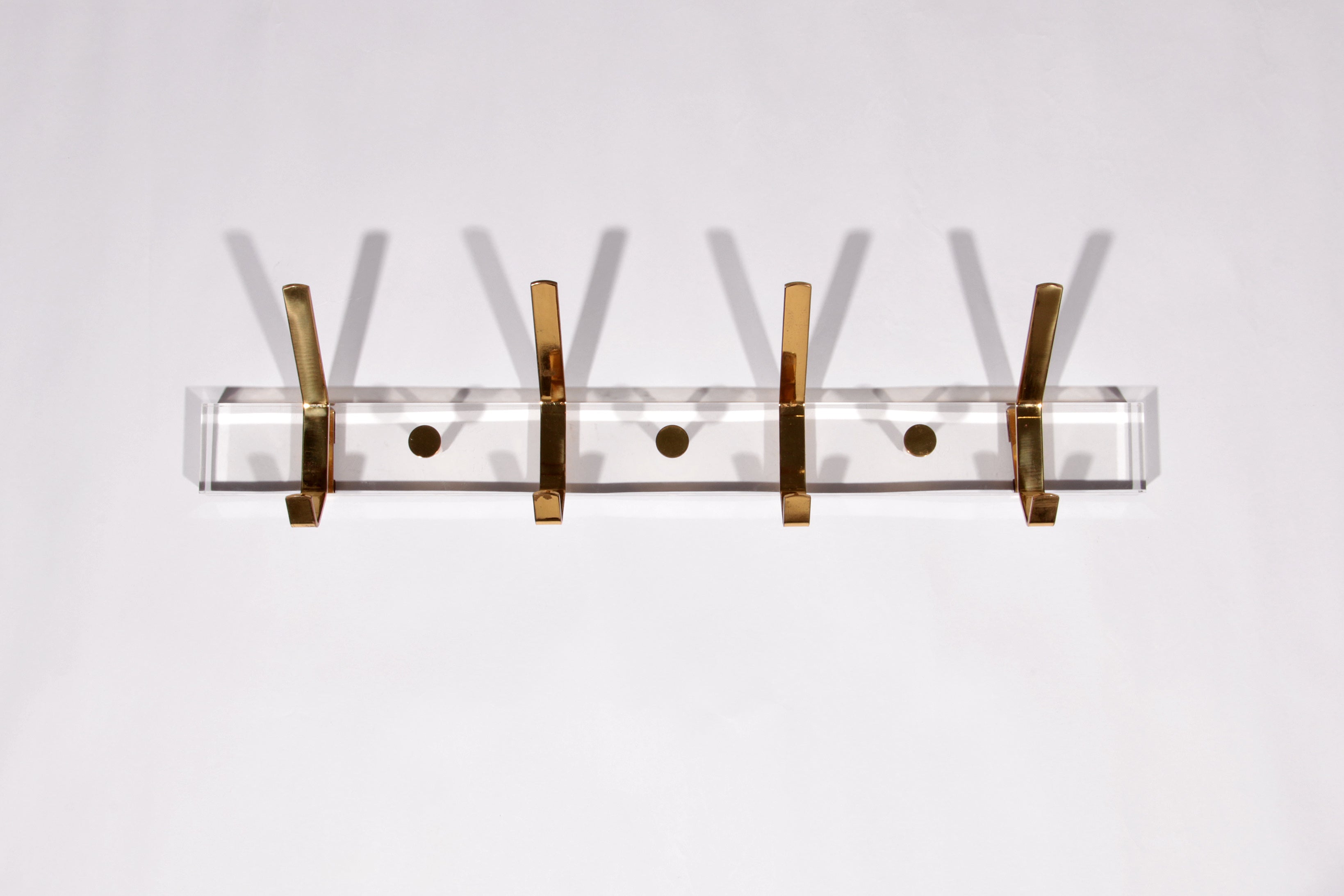 https://timeless-art.com/products/charles-hollis-jones-lucite-brass-coat-rack