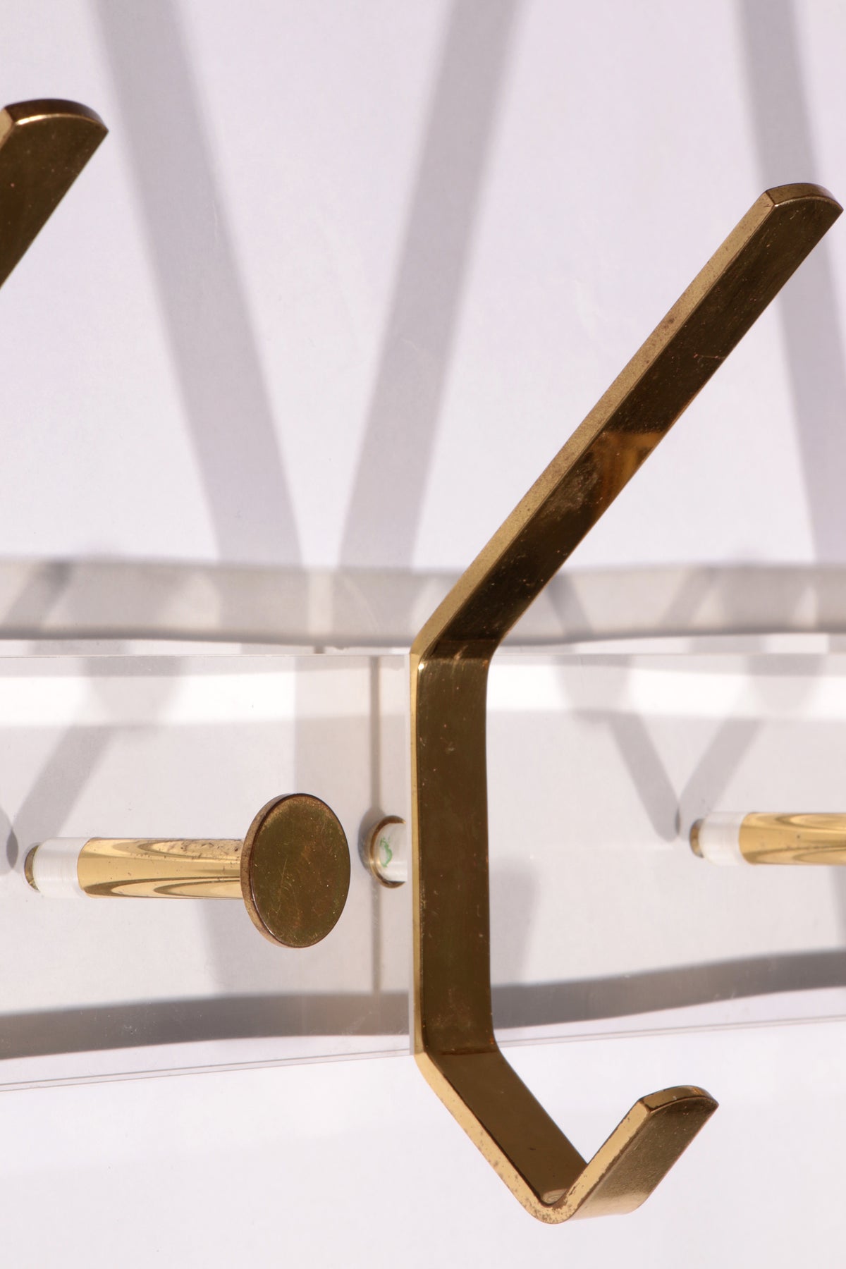 https://timeless-art.com/products/charles-hollis-jones-lucite-brass-coat-rack