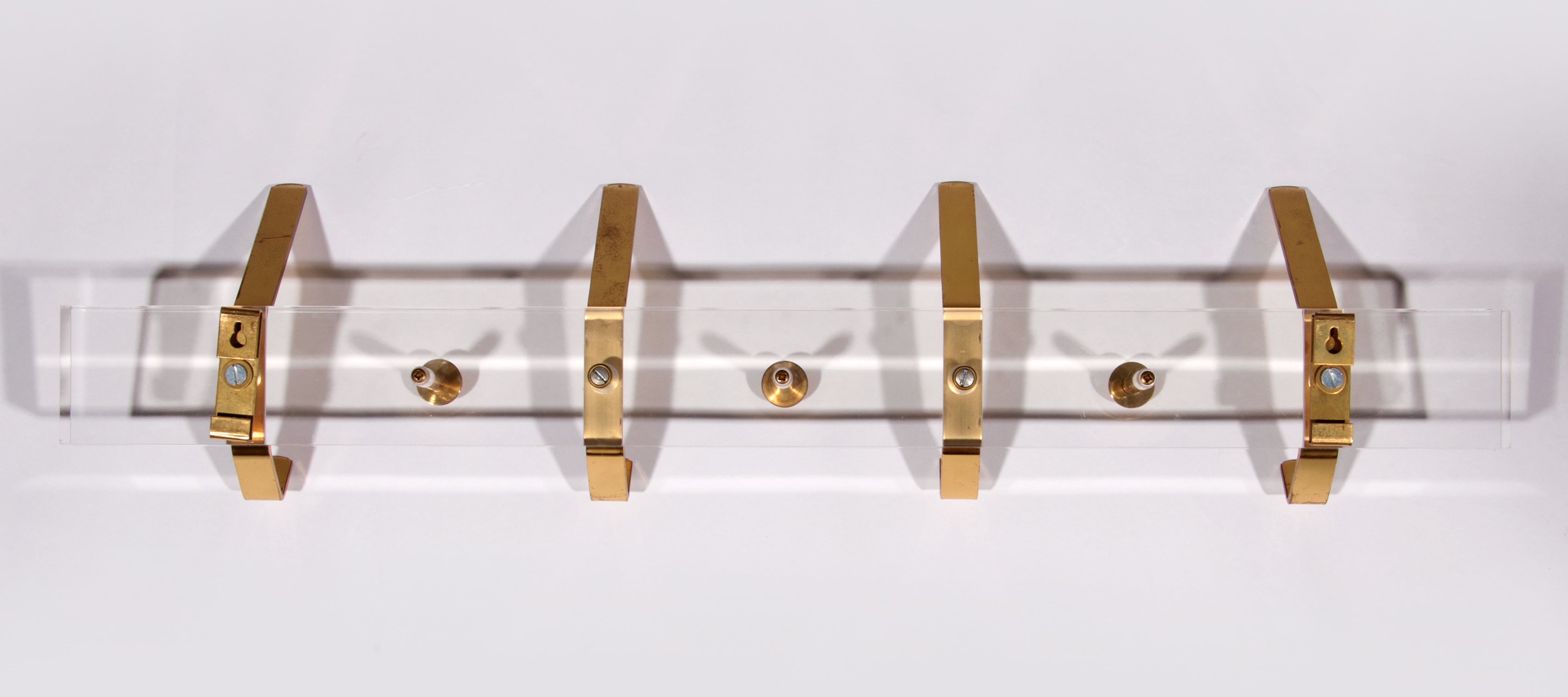https://timeless-art.com/products/charles-hollis-jones-lucite-brass-coat-rack