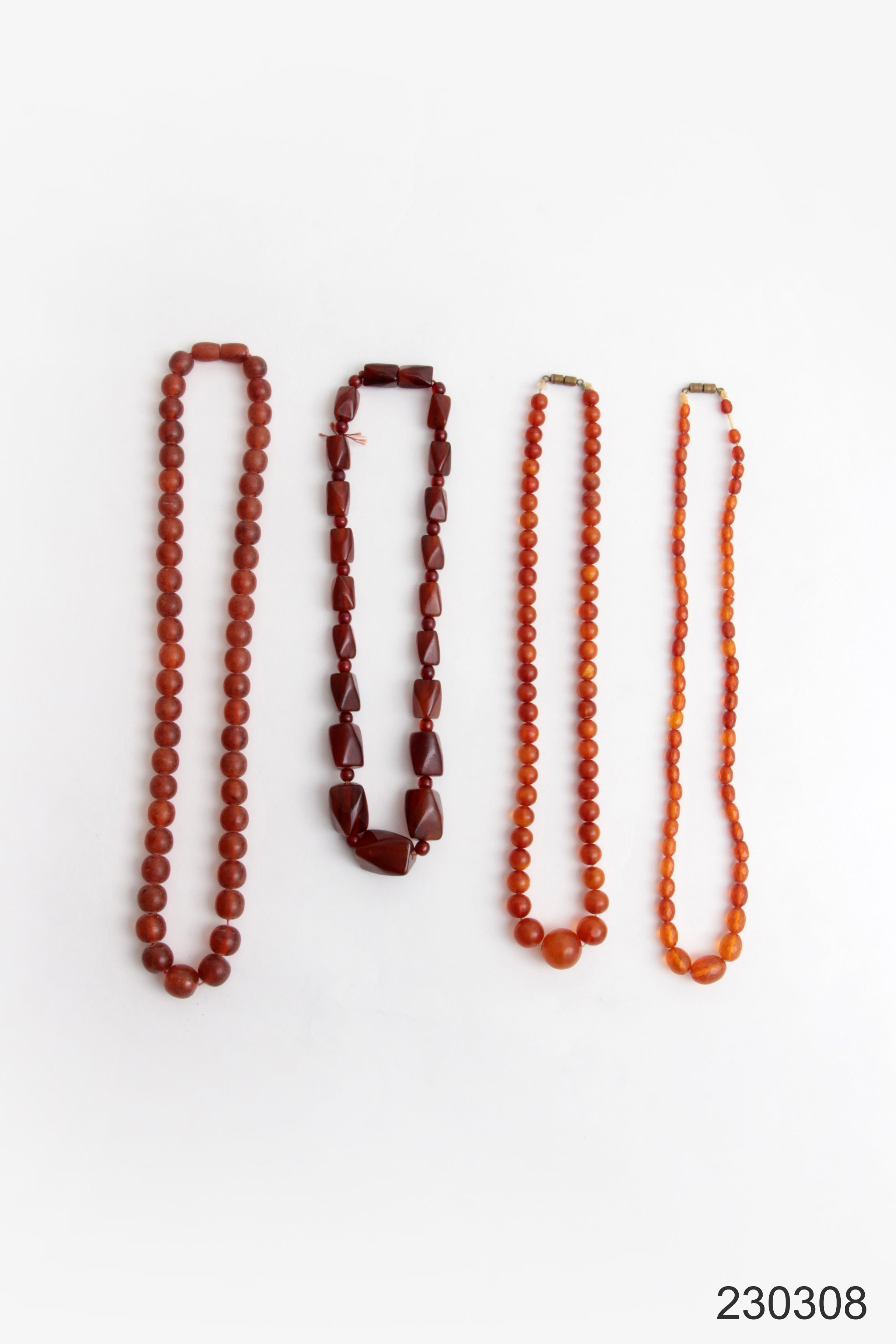 Vintage Set van vier barnsteen kettingen, 1960