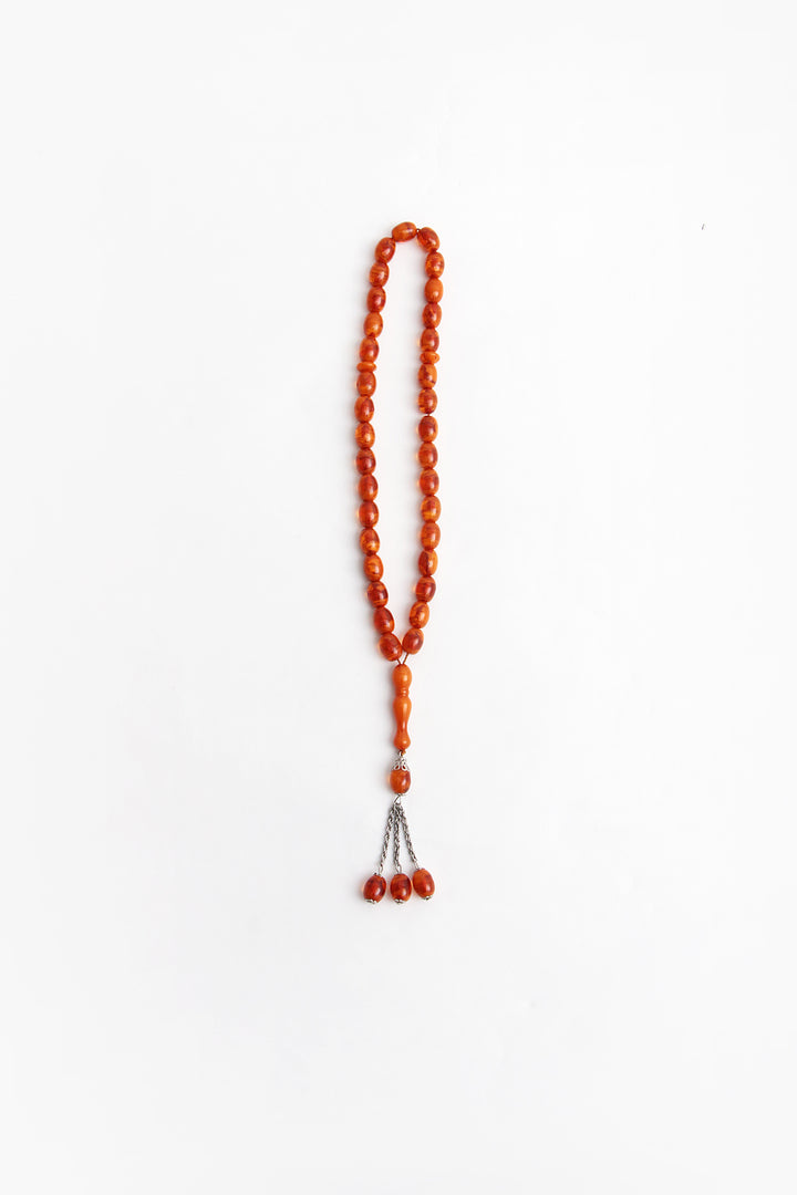 Prachtige gebedsketting gemaakt van barnsteen jaren60