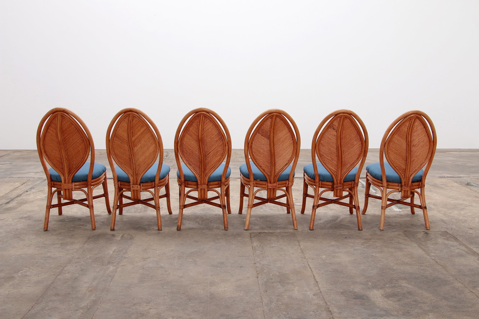 Bohemian Bamboe Mcguire  eettafel set met 6 palmblad stoelen,1960 Frankrijk.