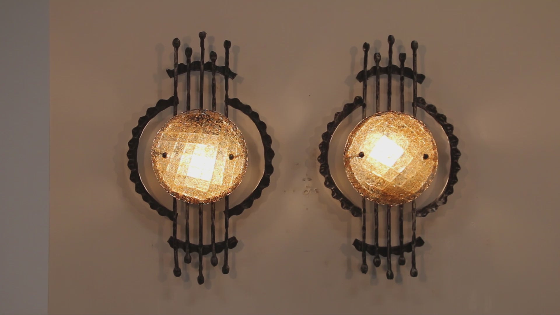 Pair of wrought iron and murano glass wall lights by Tom Ahlström & Hans Ehrich. 1970
