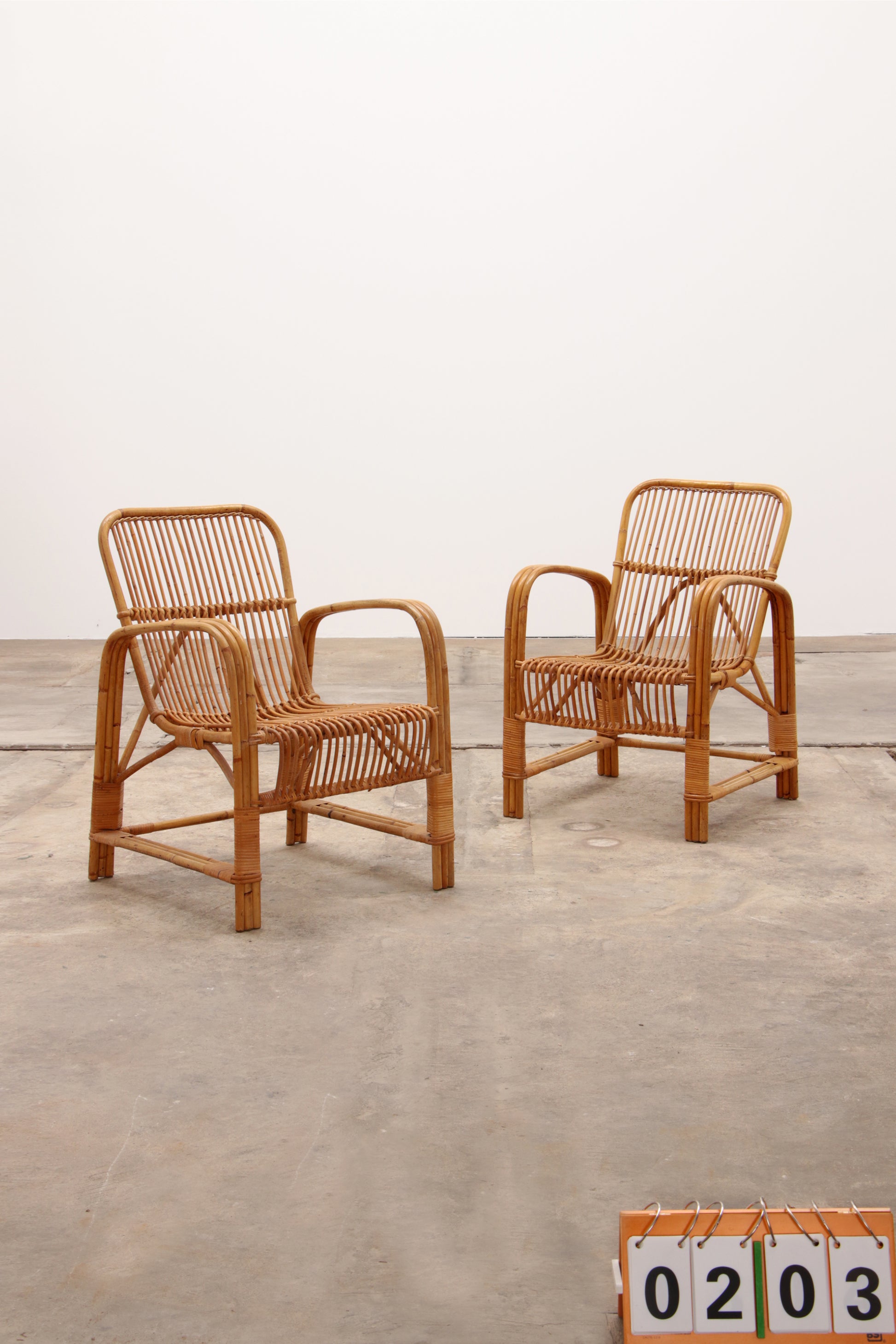 Franse Bohemian set van 2  Bamboe stoelen jaren60.
