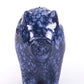 Blue ceramic piggy bank.