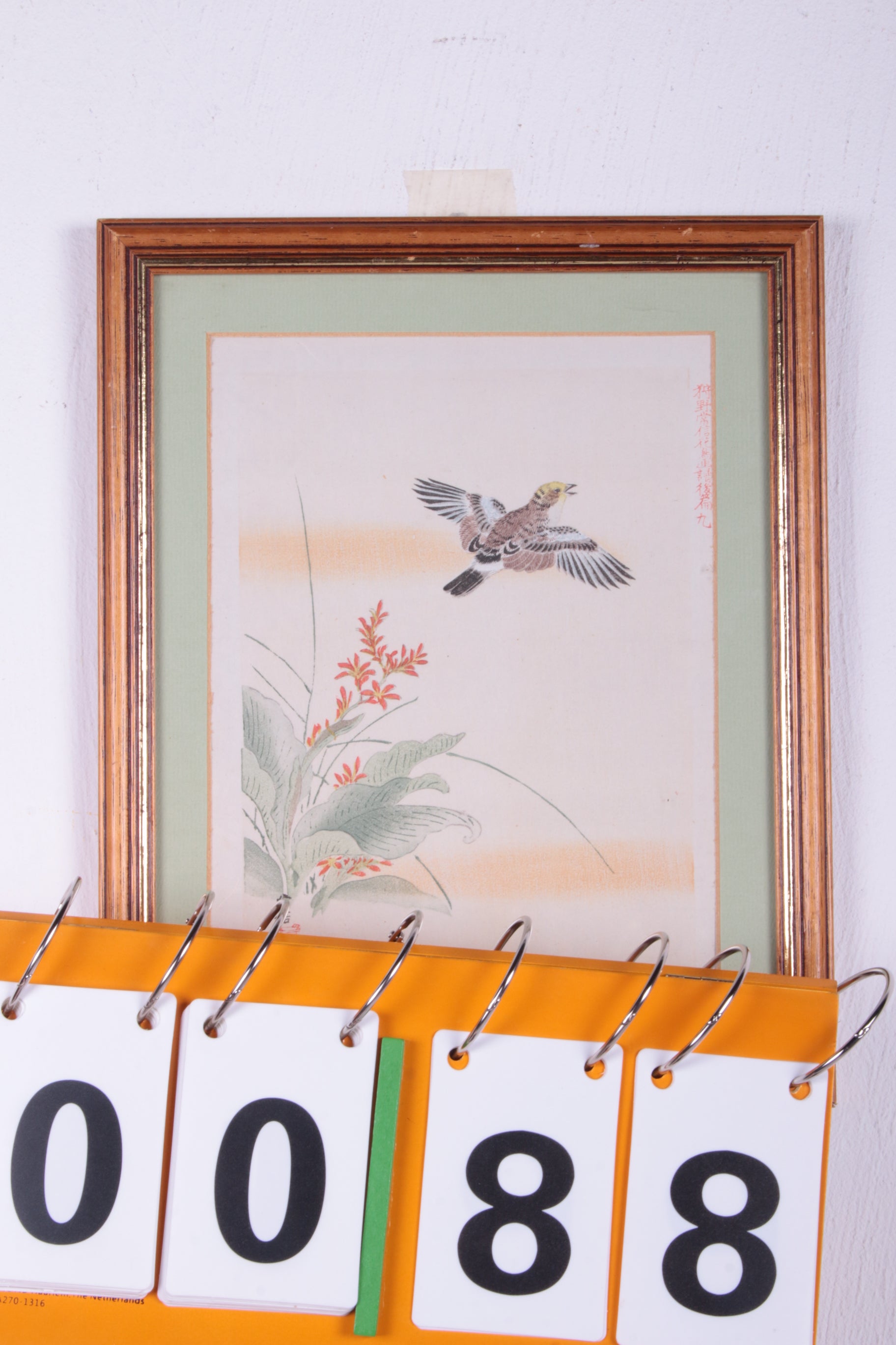 Japans Kunstwerkje Opvliegende vogel uit het groen.