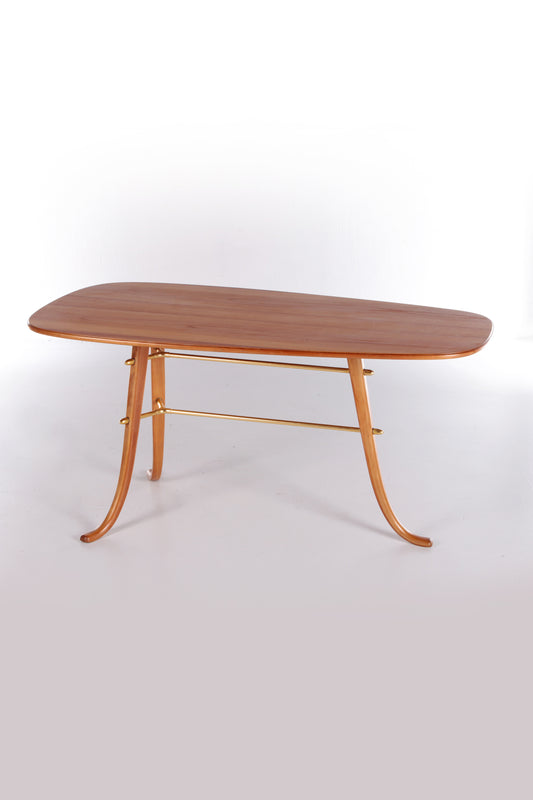 Vintage Coffee table with 3 legs and brass details Scandinavia.