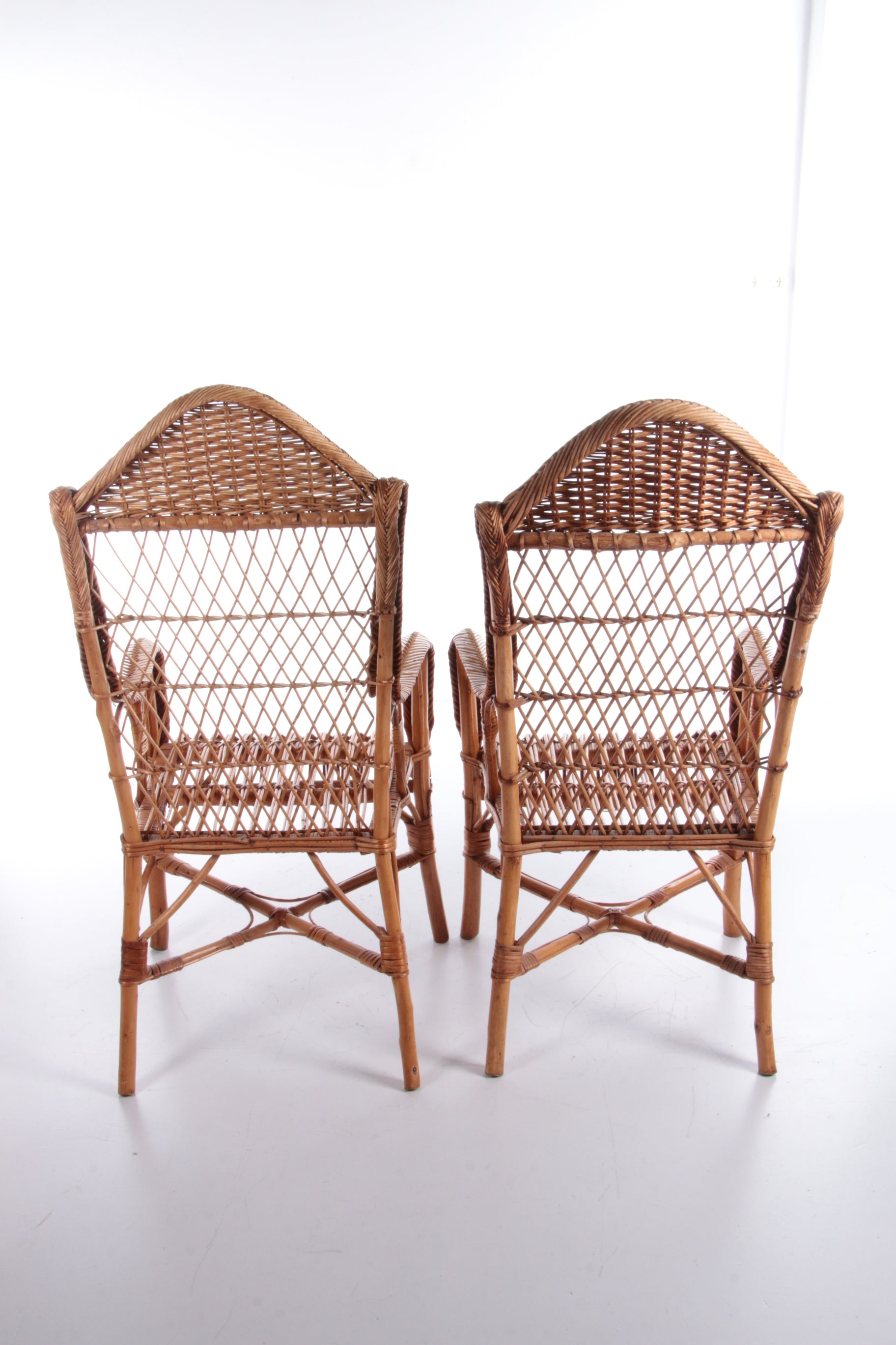 Vintage set van 2 Rotan stoelen gemaakt rond 1960s,Nederland.
