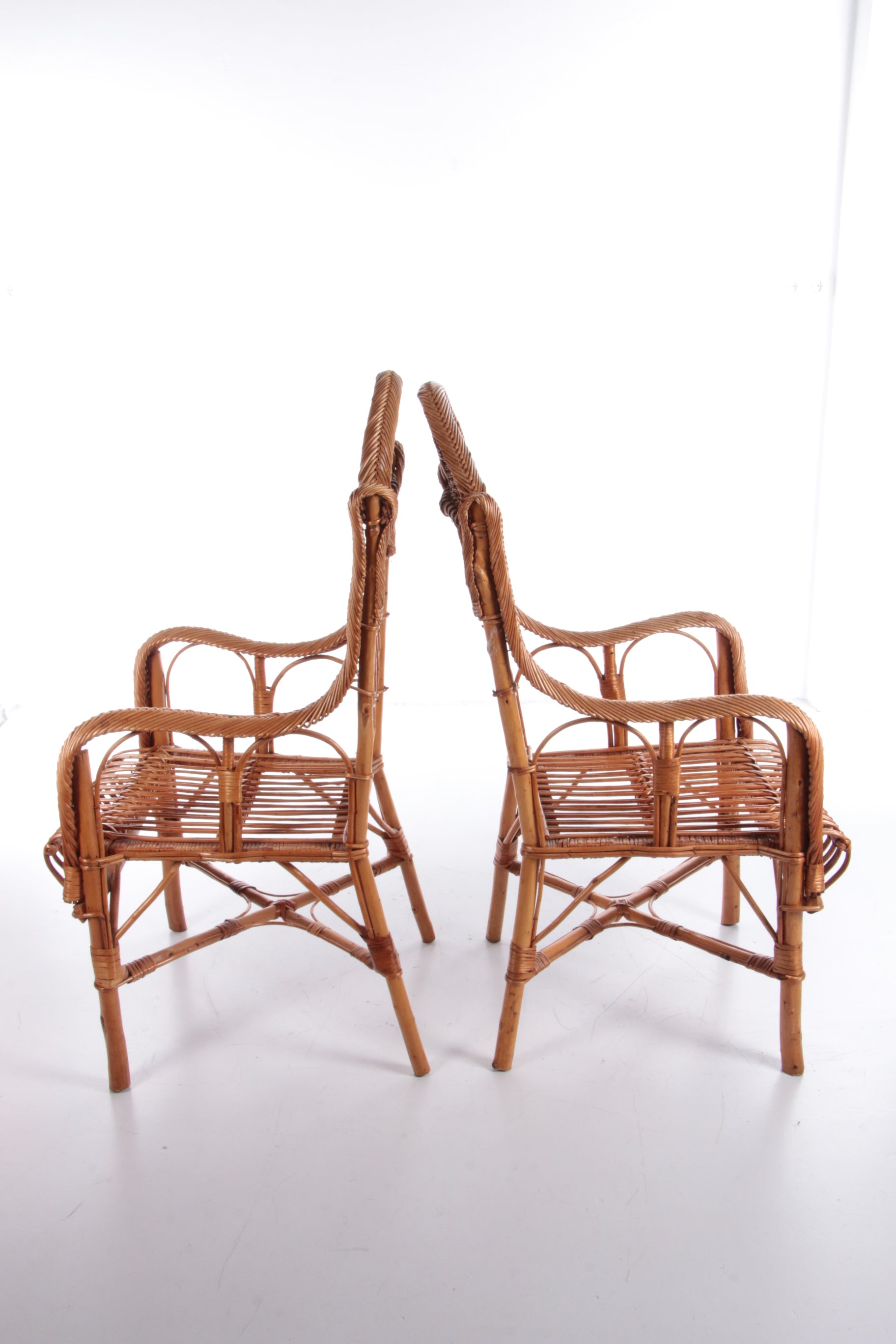 Vintage set van 2 Rotan stoelen gemaakt rond 1960s,Nederland.