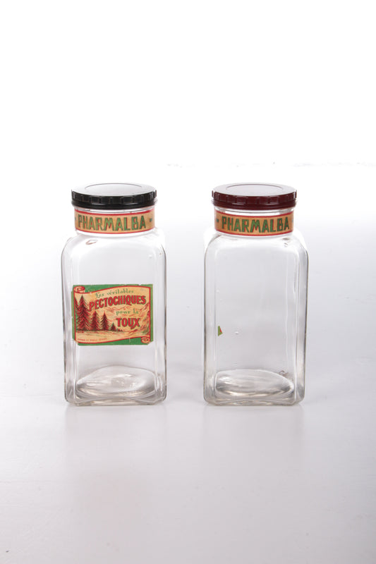 Set of very old glass candy jars with bakelite lids
