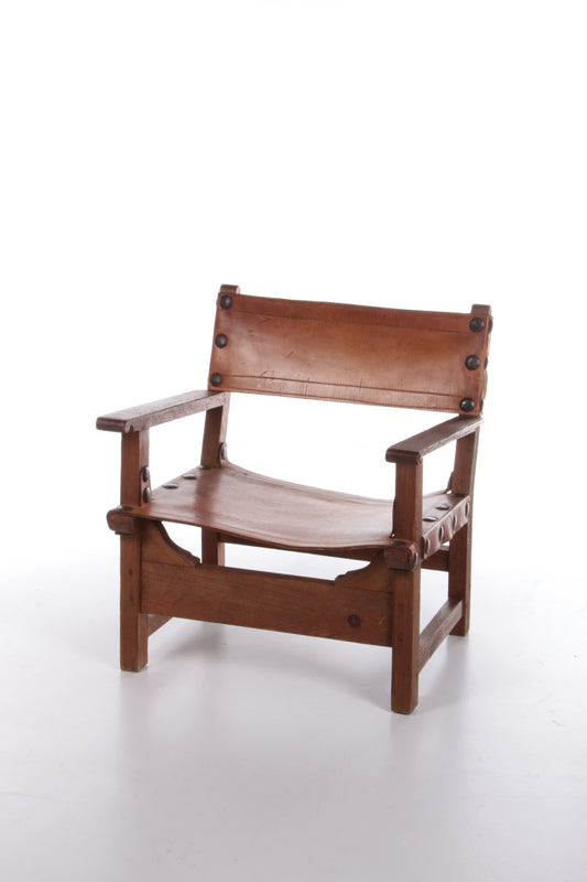 Vintage "Spanish Chair" of wood and cognac leather, Spain 60s
