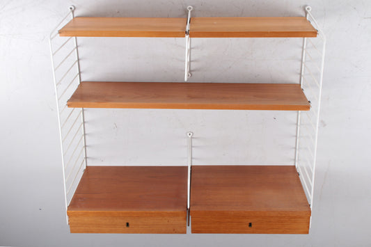 The ladder shelf wall unit by Nisse Strinning for String Design AB, 1950s voorkant