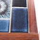 Vintage Palissander Bijzettafels met keramiek tafelblad detailfoto tegel