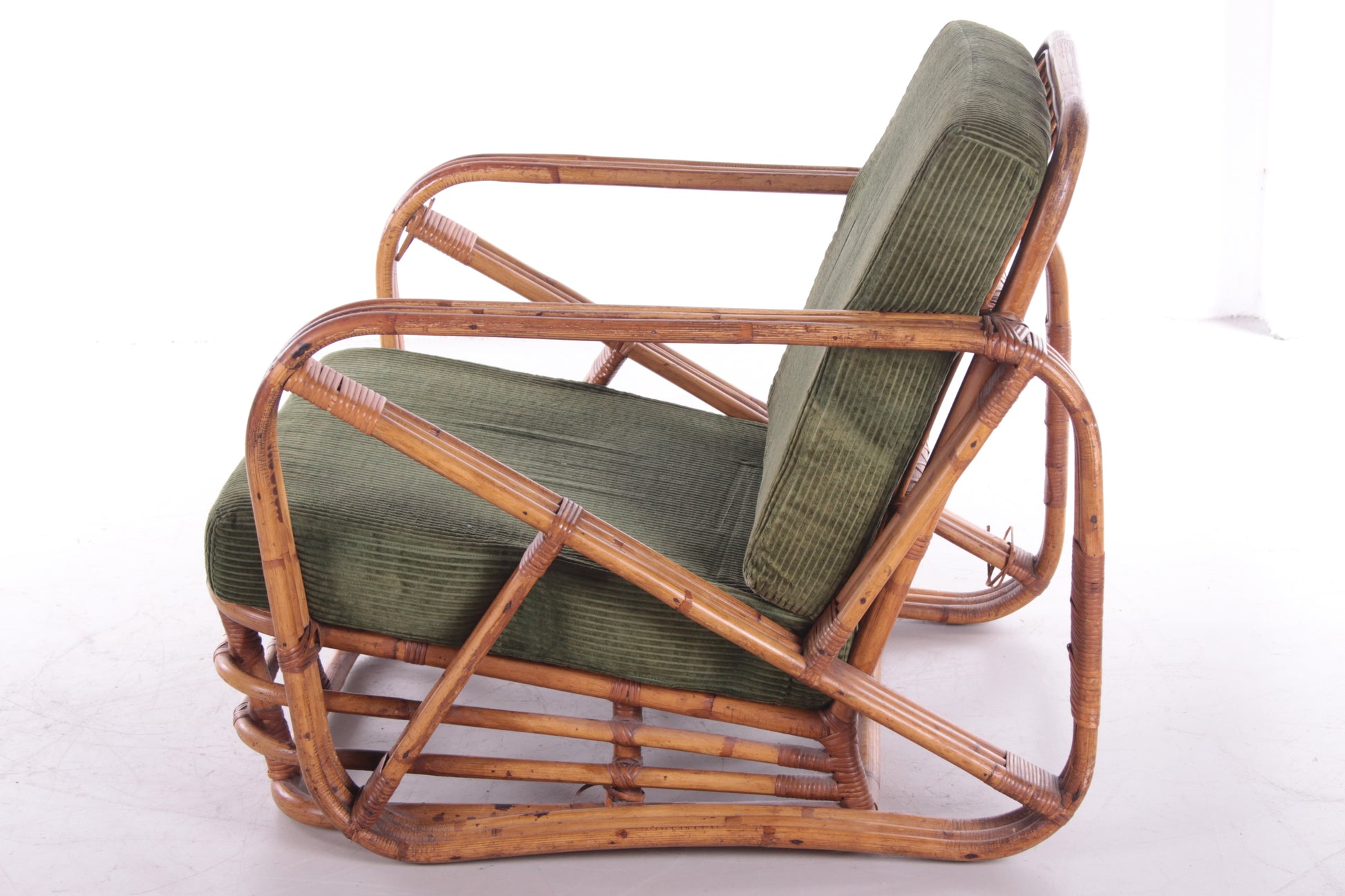 Vintage rotan bamboe lounge fauteuil Paul Frankl zijkant