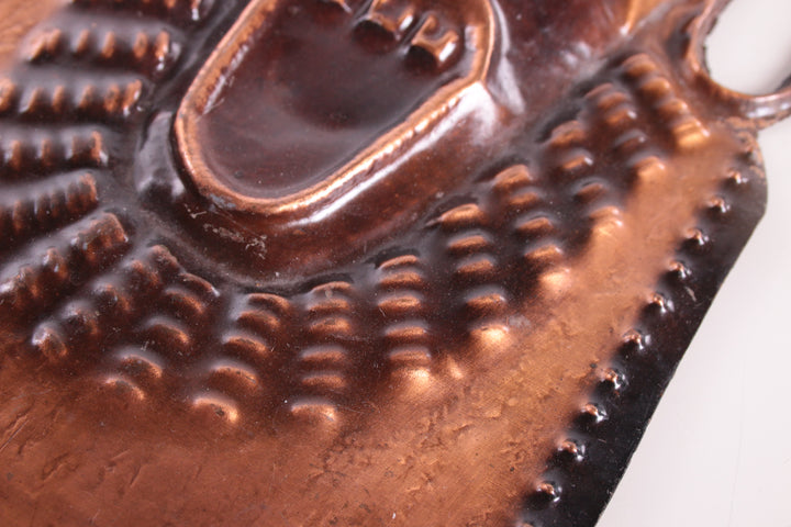 Set Vintage koperen maskers detail onder