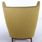 Deense fauteuil met pallisander houten onderstel mosgroen achterkant