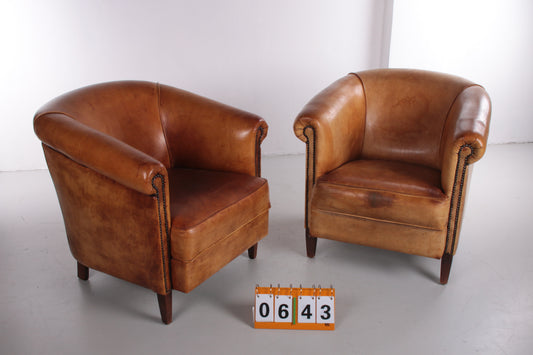 Set of 2 Sheepskin leather club chair with beautiful patina.