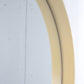 Ronde Creme wandspiegel met kunststofrand detail rand binnenkant