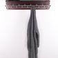 Wandkapstok met chrome haken en hoedenrek jaren60 sfeerfoto