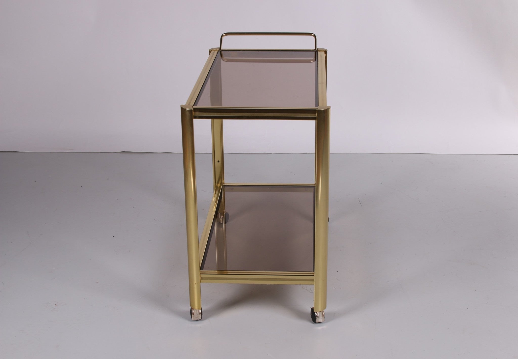 Hollywood Regency trolley met gerookt glas zijkant