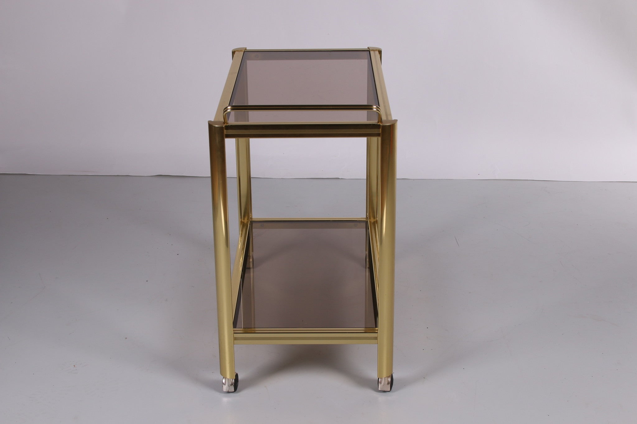 Hollywood Regency trolley met gerookt glas zijkant