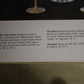 1 Losse Eero Saarinen Knoll Witte rode draai stoel detail tekst